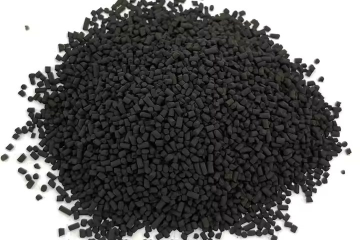 A mound of small, manganese dioxide catalyst pellets