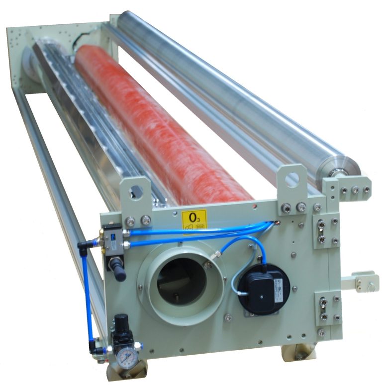 Wide format corona treater with red silicon sleeve covered roller